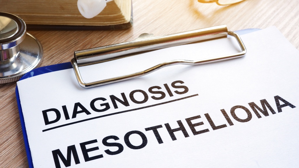 Diagnosis Mesothelioma and stethoscope on a desk